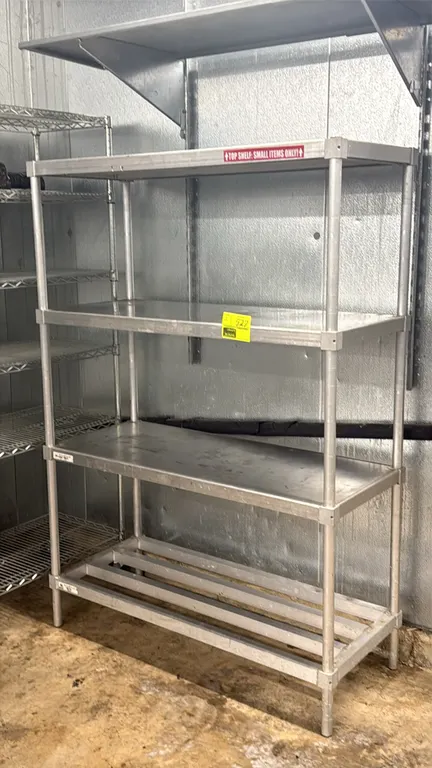 Aluminum 4-tier shelving racks. Features 3 solid upper shelves and 1 slatted bottom shelf. Dimensions: 48"L x 20"W x 68"H each.