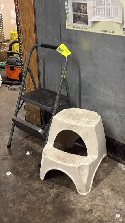 Assorted step stools. Includes (1) folding metal 2-step ladder stool with top hand rail and textured tread steps, and (1) molded plastic 2-step stool