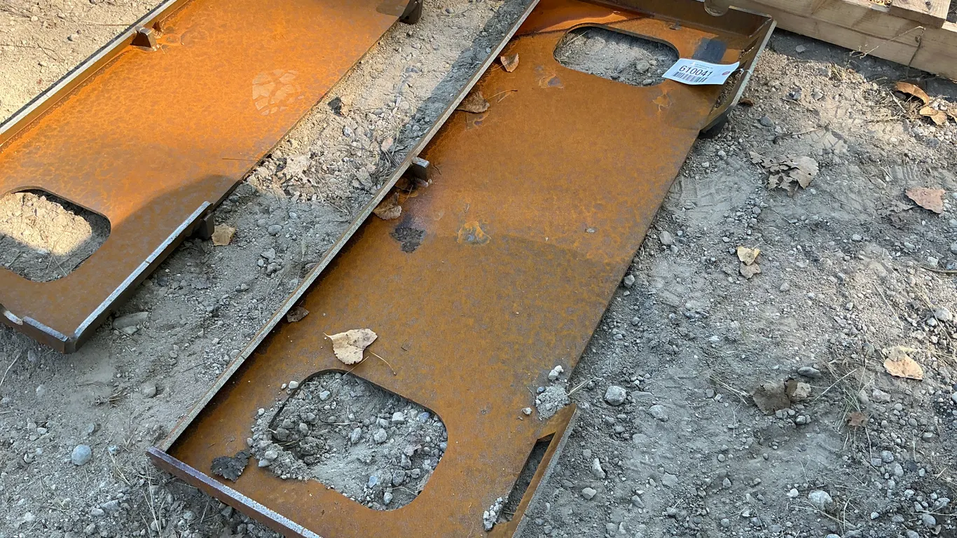 UNUSED BLANK SKID STEER PLATE