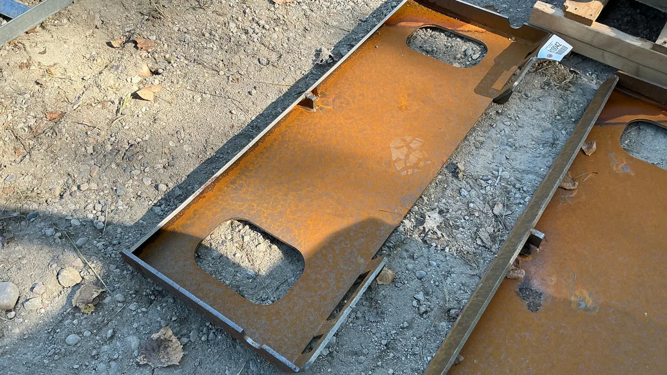 UNUSED BLANK SKID STEER PLATE