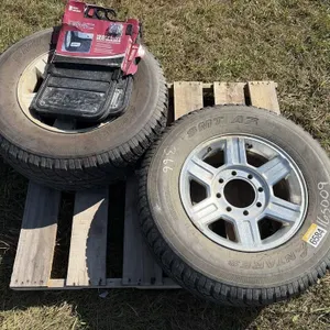 2 Tires & Rims & New Mud Flaps
