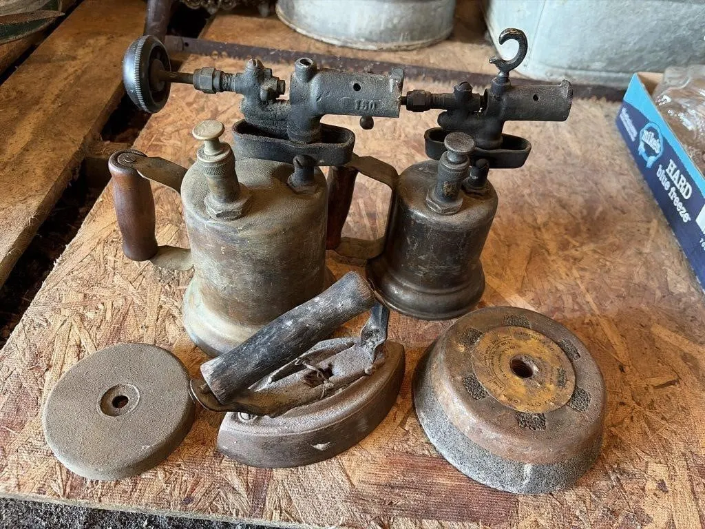 vintage brass blowtorches, sad irony, Grinding