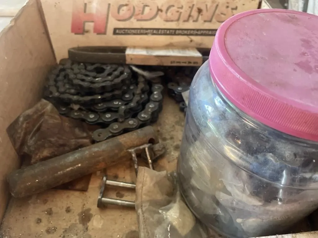 Assortment of roller chain and links.