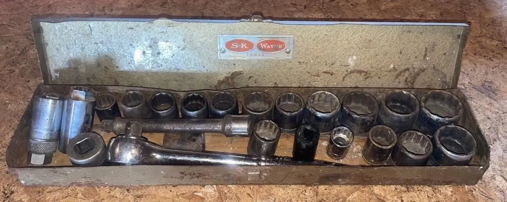 Incomplete set of half-inch drive sockets in a