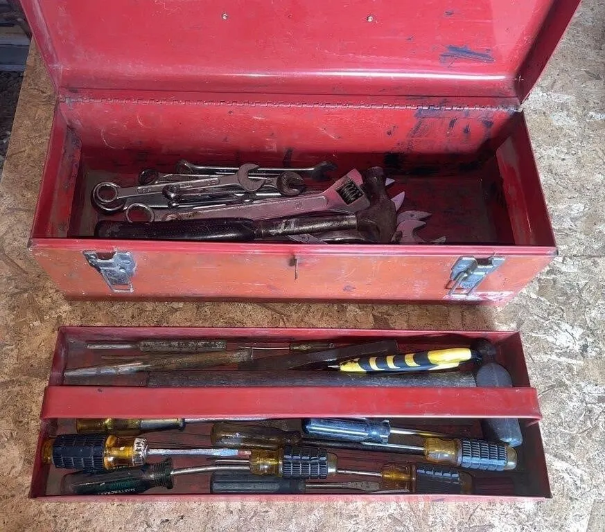 Toolbox with screwdrivers, wrenches, a hammer