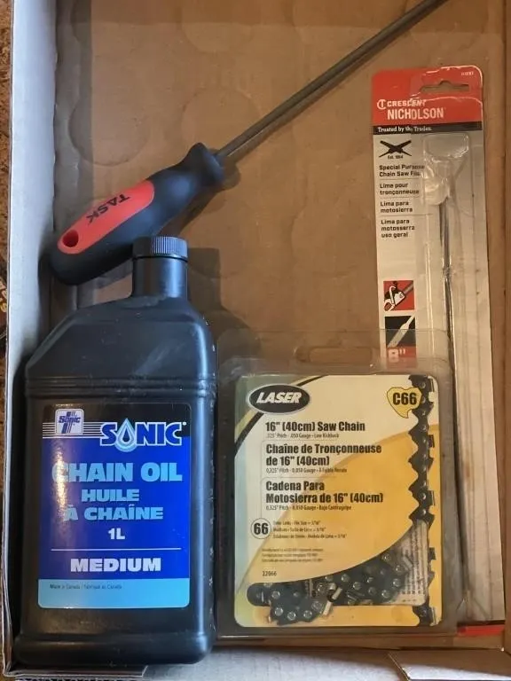 Chainsaw bar oil, files, and a 16-inch Laser saw