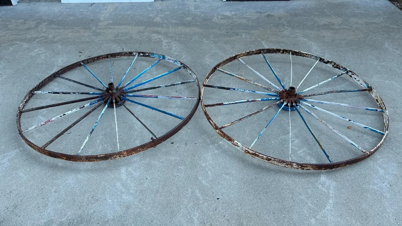 Two 53.5” steel implement wheels. Flat spokes.