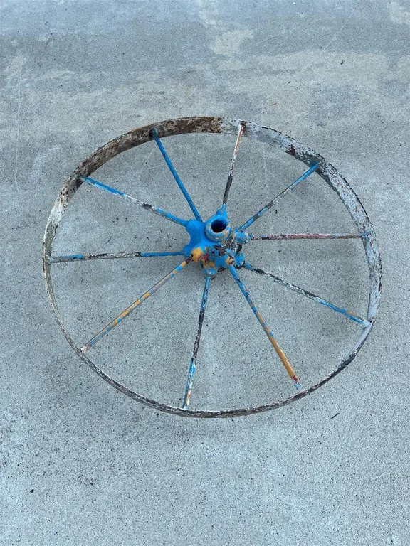 Steel implement wheel. 29.5”‘across