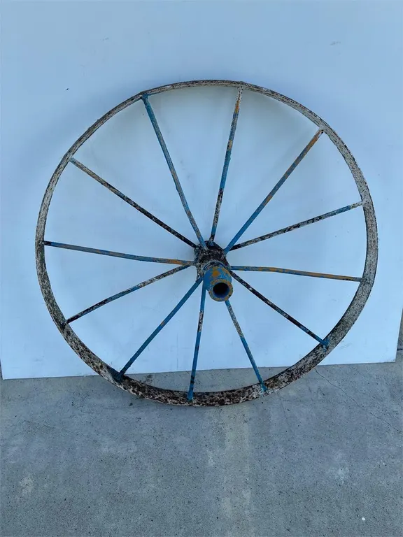 33” steel implement wheel.