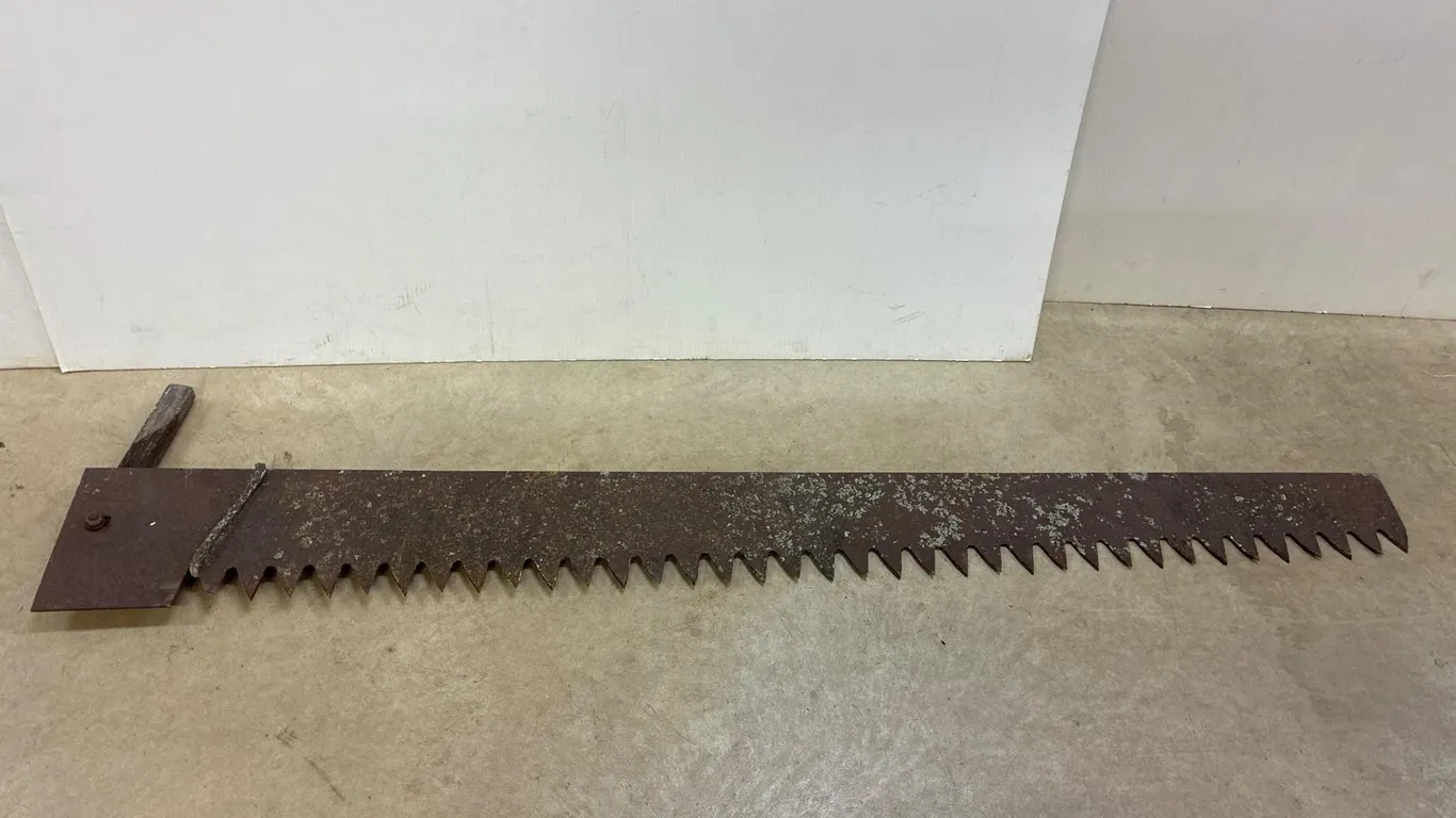 Heavy 60” ice saw.
