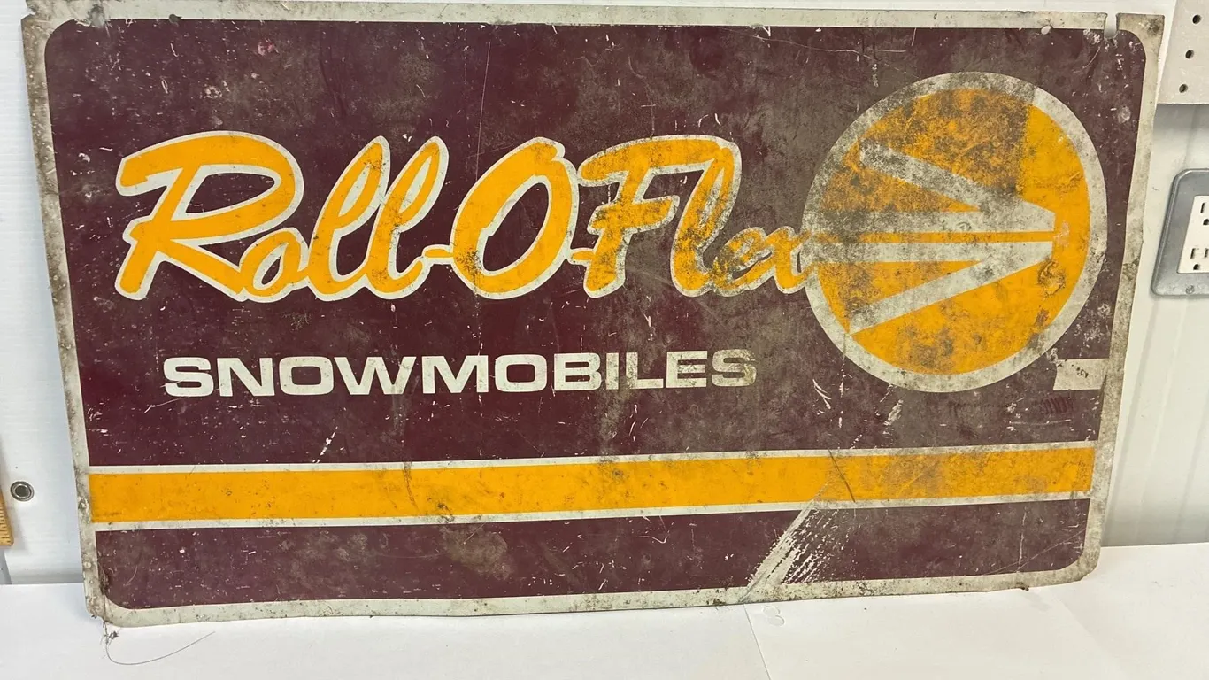 Roll-O-Flex tin sign. Was 2 sided. 32 x 18”