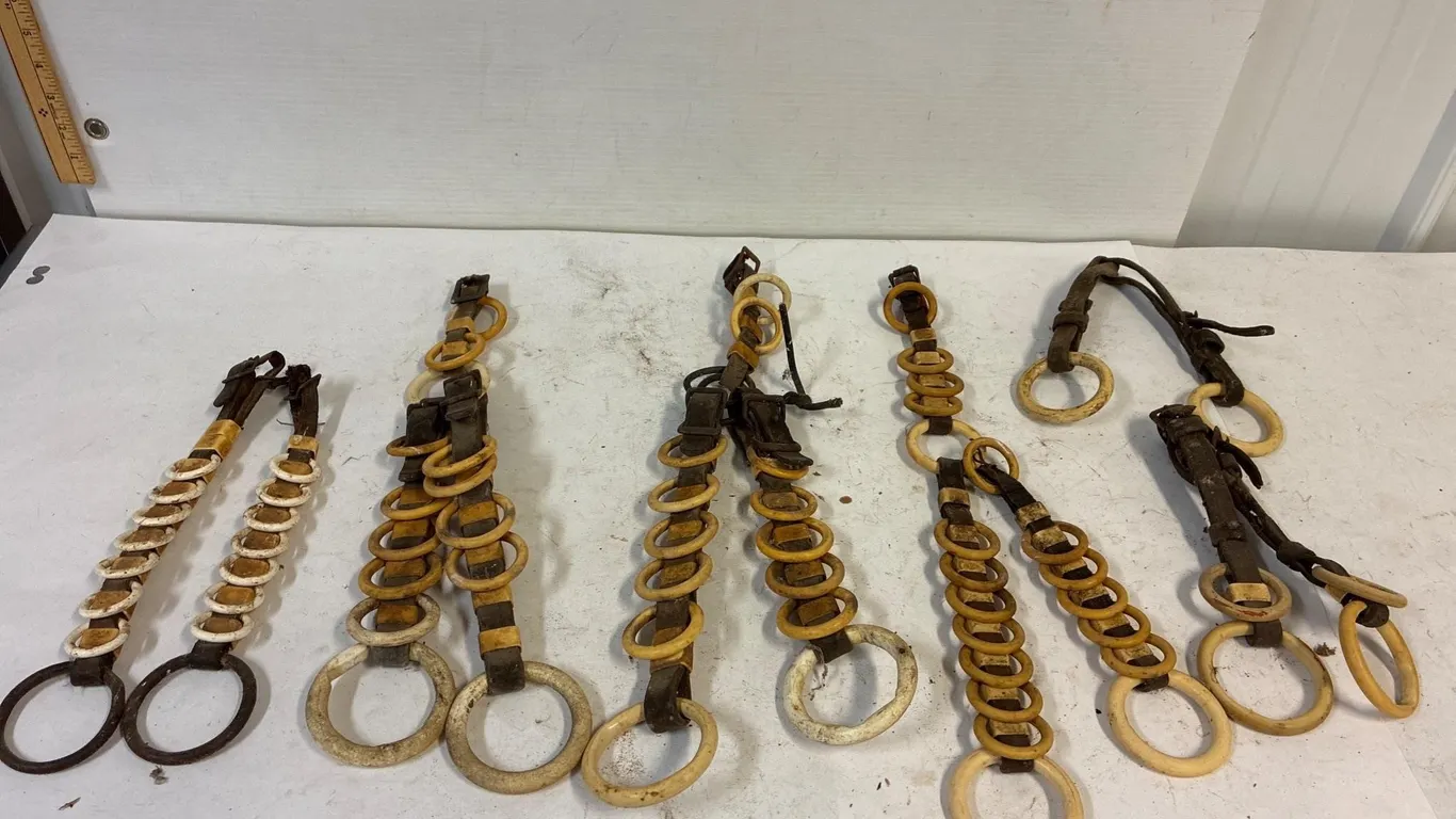 White spreader rings. Assorted. Dried out leather