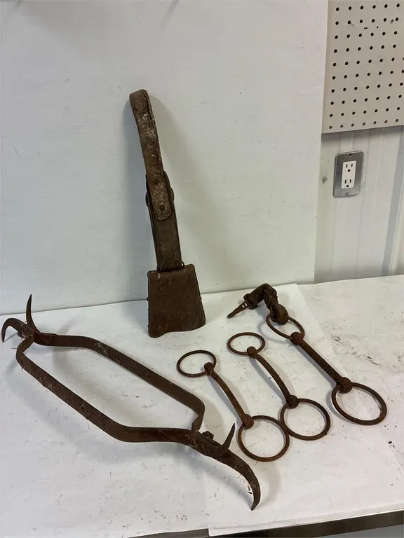 Cow catcher. Cow bell. Bits.