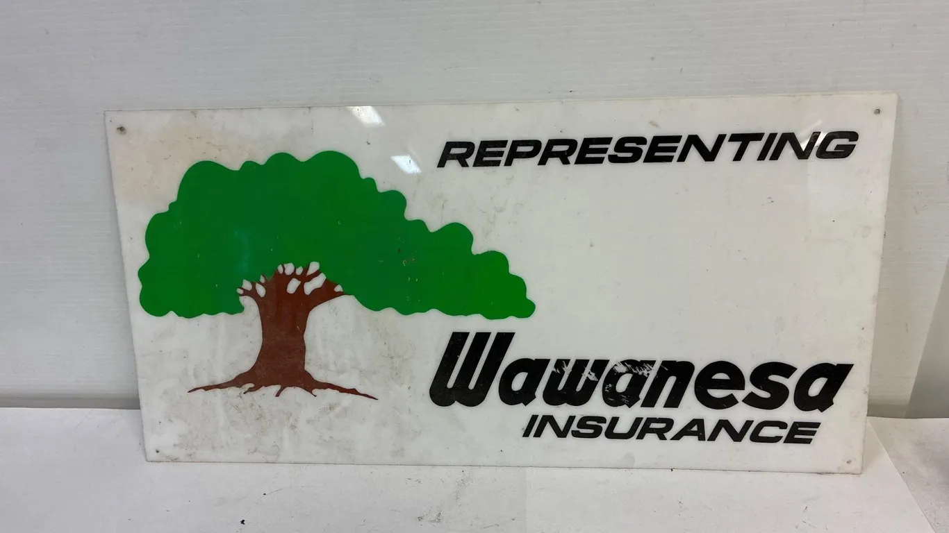 Wawanesa plastic sign. 1 sided. 24 x 12 1/4”