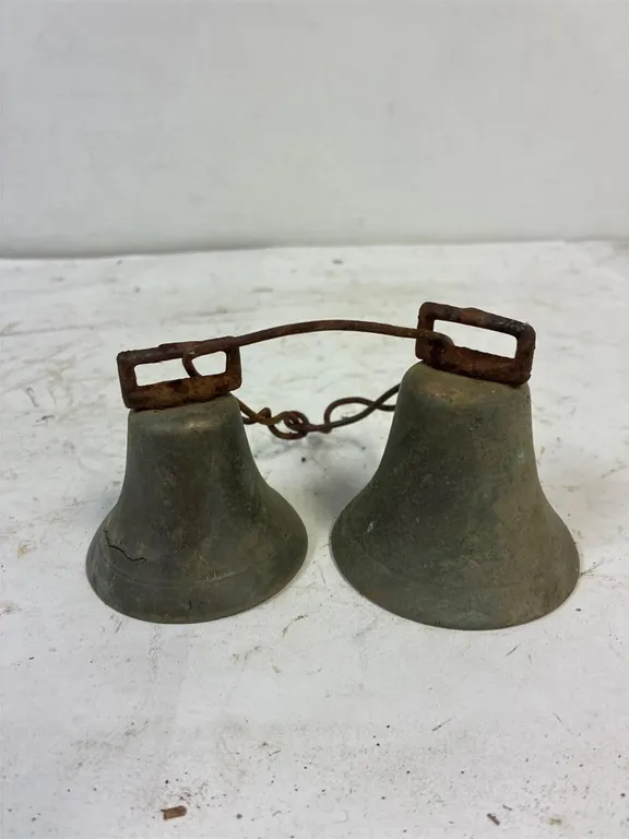 2 brass bells.