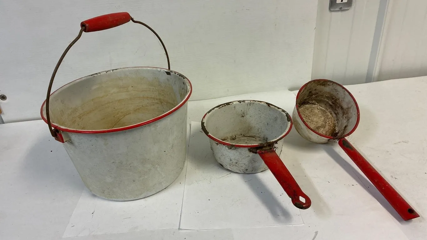 Enamelware bucket and dippers.