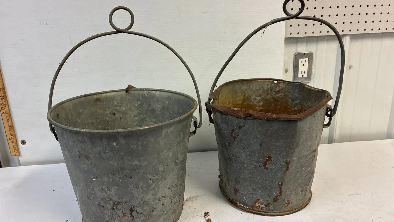 2 retro galvanized well buckets.