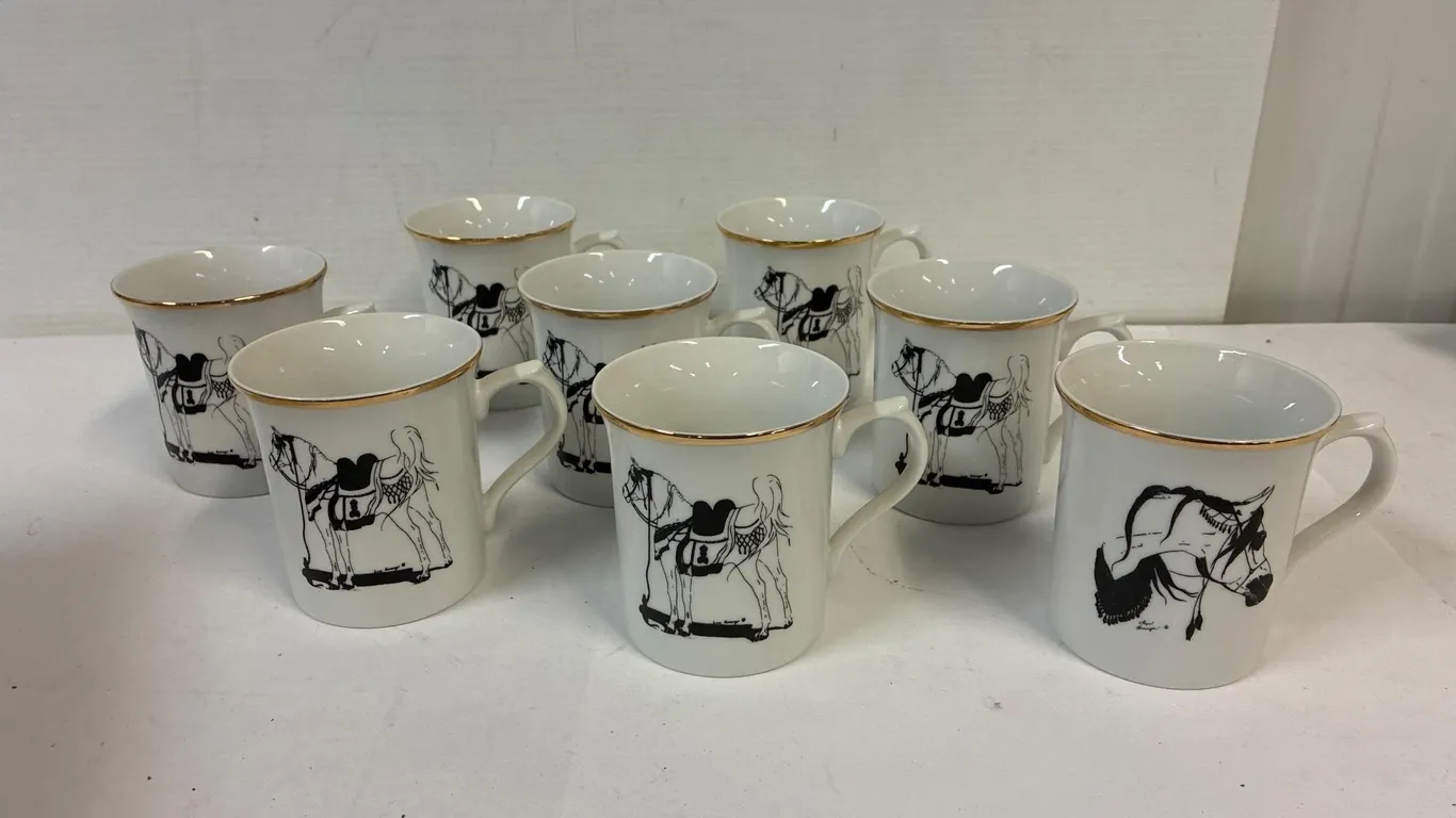 8 Arabian coffee mugs.