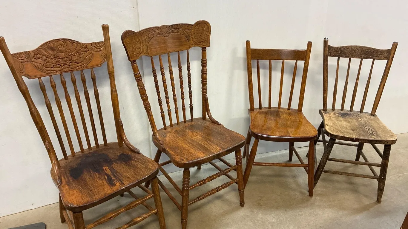 4 different wooden Chairs.