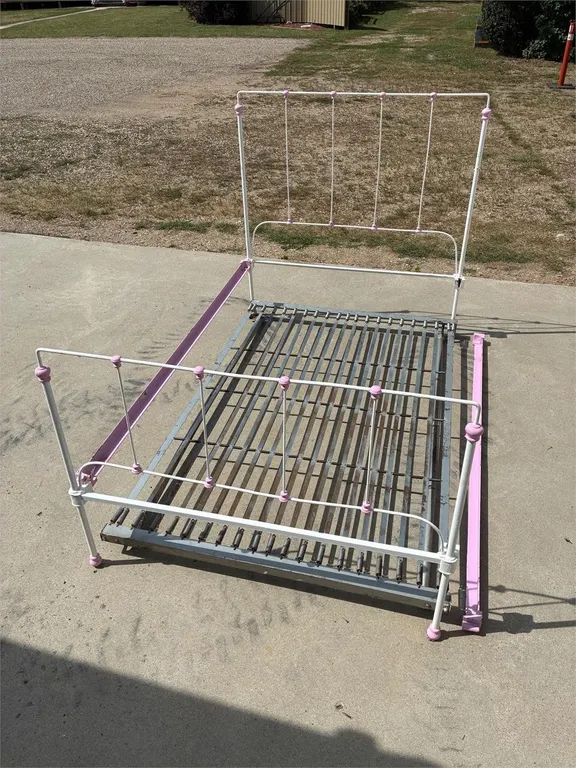Wrought iron bed with spring. White & Pink