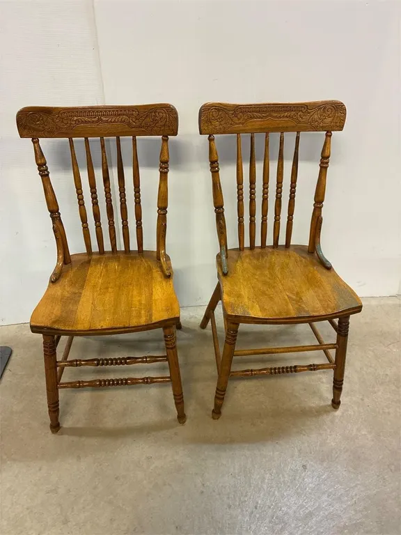 2 antique press back chairs.