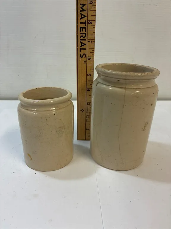 Stoneware jars. 1 has hairline cracks