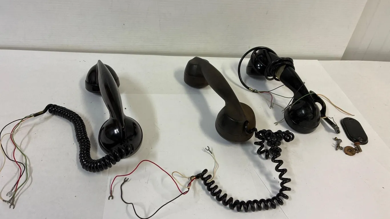 Antique telephone bakelight hand sets.