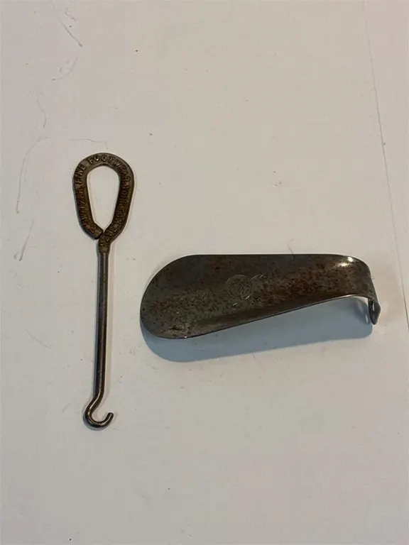 Button hook and shoe horn.