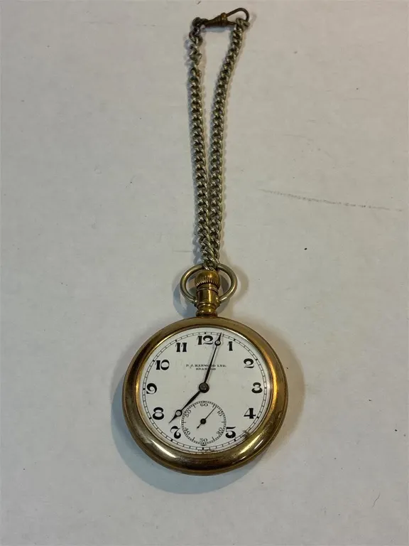 PJ Harwood pocket watch. Appears to keep time