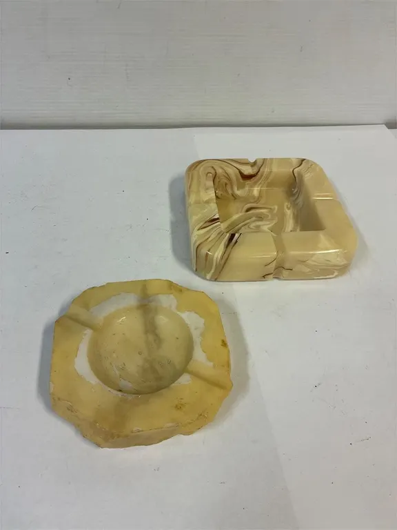 Marble ashtrays. Or call them candy dishes