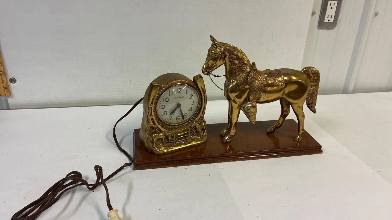 Brass western horse clock. Needs a new cord