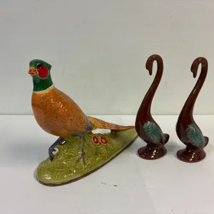 3 pottery birds.