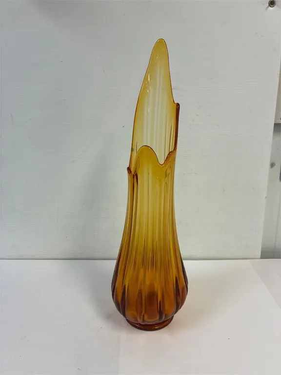 Ribbed amber glass mid century vase. 22” tall