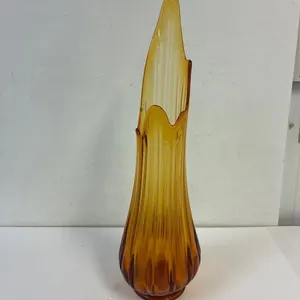 Ribbed amber glass mid century vase. 22” tall