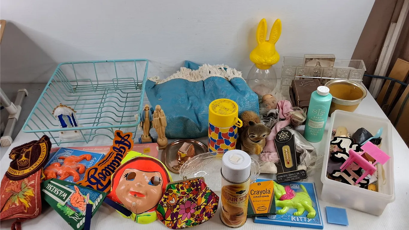 Dish Drying Rack, Face Mask, 1867 - 1967 Thermometer, Crayons, Aladdin Insulated Cup, Tablecloth