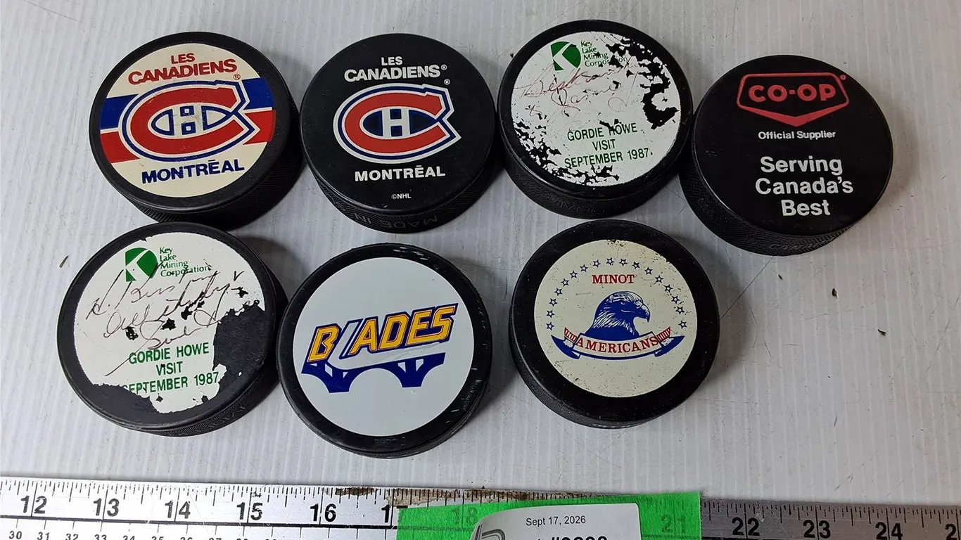 (7) Hockey Pucks- Montreal Canadiens, Saskatoon Blades, Minot Americans, Misc.