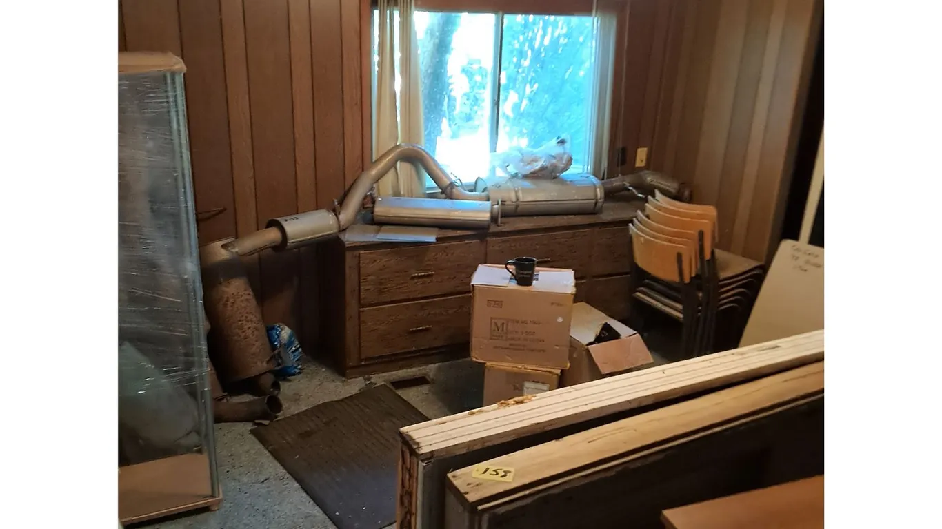 Room Contents - Dresser, Stove, 98 Dodge 1-Ton Tail Gate, Chairs, Mufflers, Display Case