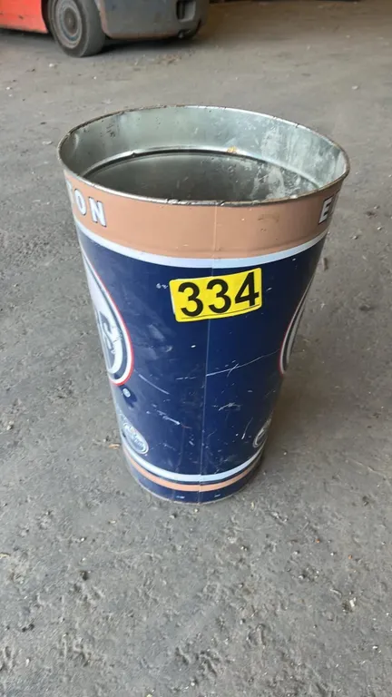 OFFSITE - Edmonton Oilers trash can with approximately 12 to 15 pliers.
