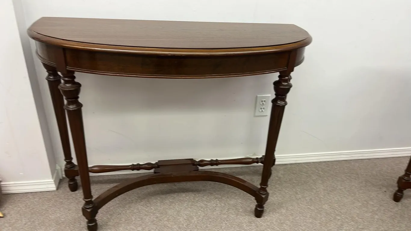 OFFSITE - 1 half moon table in great condition 39 1/2”x16 1/2”x30” tall.