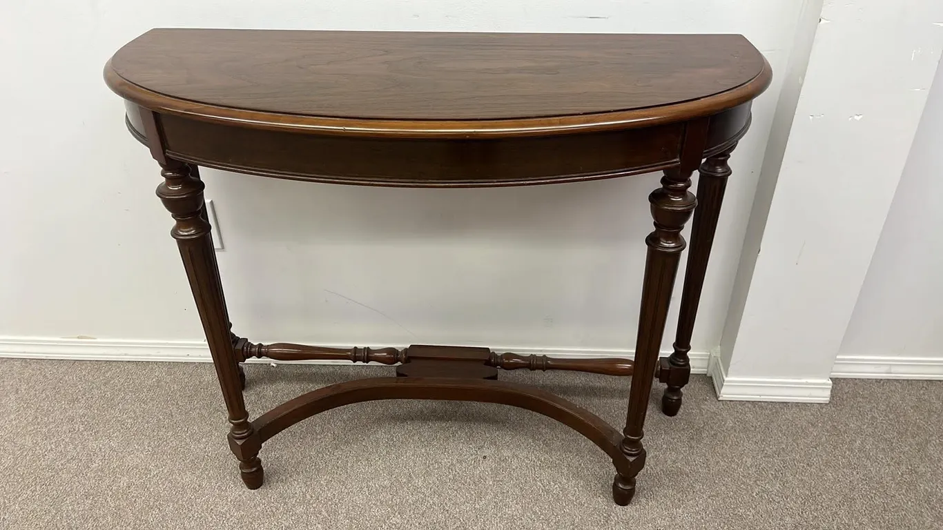 OFFSITE - 1 half moon table in great condition 39 1/2”x16 1/2”x30” tall.