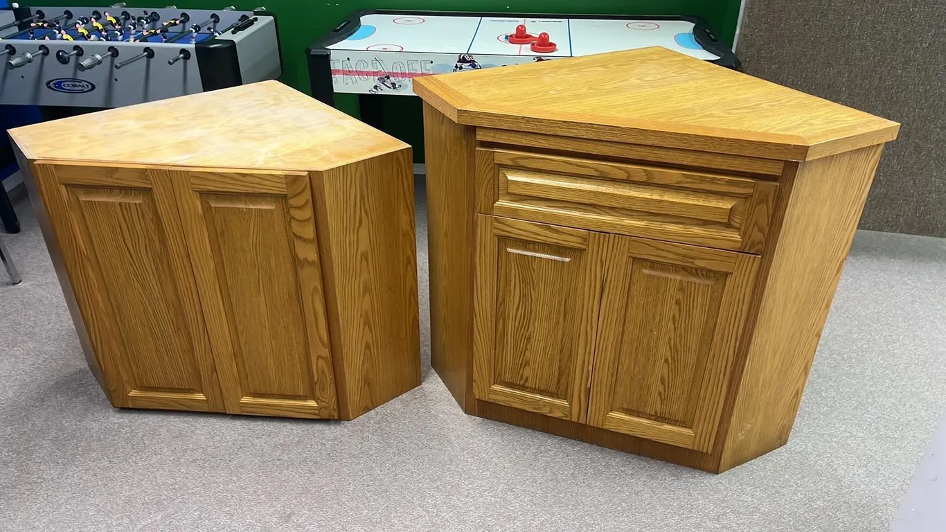 OFFSITE - 2 piece corner cabinet, solid oak front. 1 sits on top of the other. 30”x30”x28 1/2” deep and 66 1/2” tall.