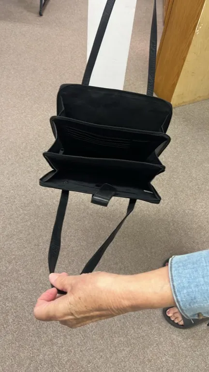 OFFSITE - Leather carry bag in nice condition.