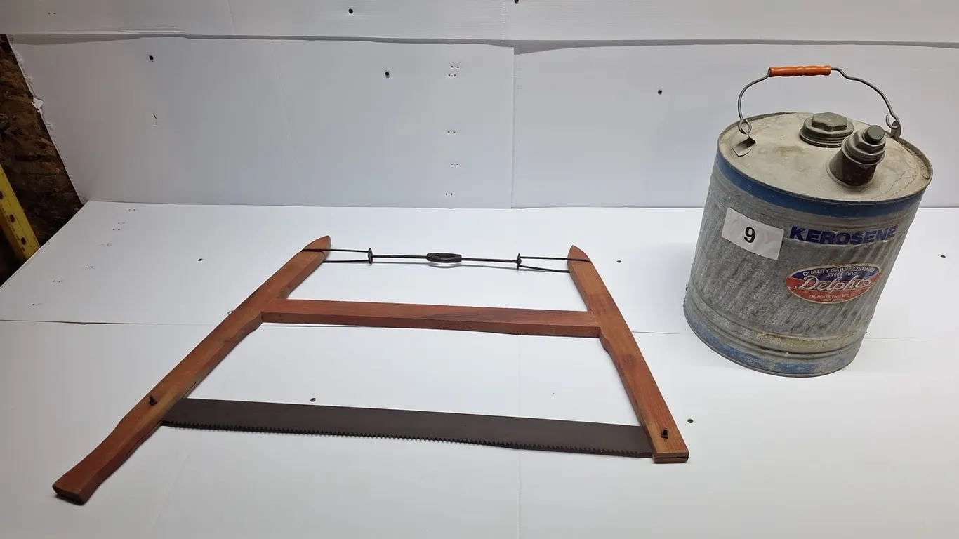 Hand saw and karosene jerry can
