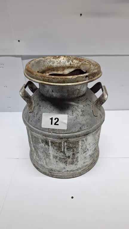 Milk or cream can. 17' H
