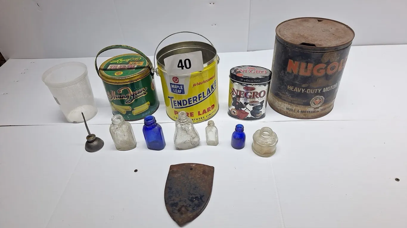 Miscellaneous tin and glass bottles