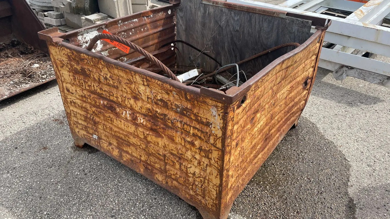 Metal Bin with Scrap Metal Pieces