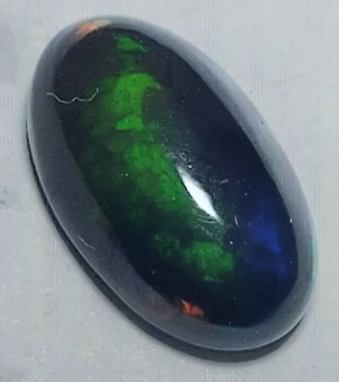 Australian Black Opal (1.10 ct, 10.5×6 mm)