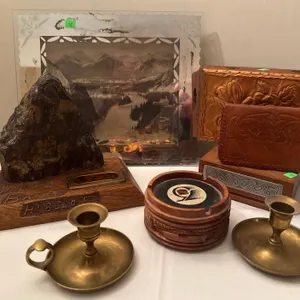 Table Lot With Candlesticks, Leather Boxes, Banff Souvenir, and Art