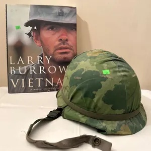 Vietnam War Book by Larry Burrows with U.S. Military Helmet and Camouflage Cover