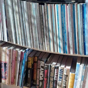 Hardcover Books, Paperbacks, and Magazines on Shelf